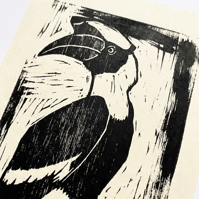 [object Object] — Carved block printing — chunky, black, and physical.